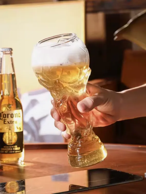 Pouring beer into trophy glass